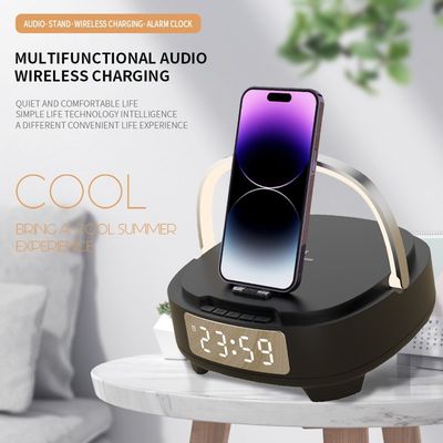 Wireless Fast Charger with Night Light Bluetooth Speaker and Alarm Clock 9V/2A Input